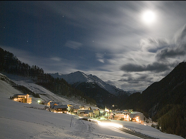 Samnaun village in the Swiss Alps at night — duty-free zone and headquarters of Silver Spirits AG